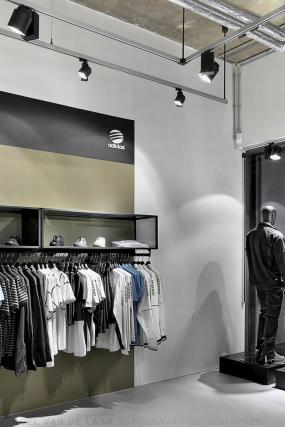 簡約裝修風格服裝店貨架效果圖